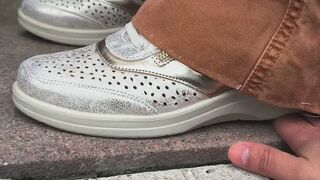 My neighbor crushes my hand with her sneakers