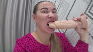 Horny play and biting big dildo with sexy lips